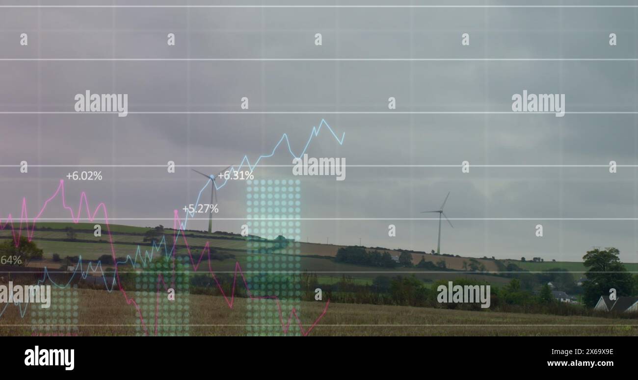 Image of financial data processing over wind turbine Stock Photo