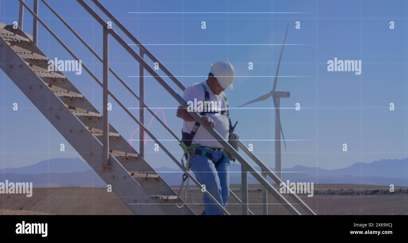 Image of financial data processing over wind turbine Stock Photo