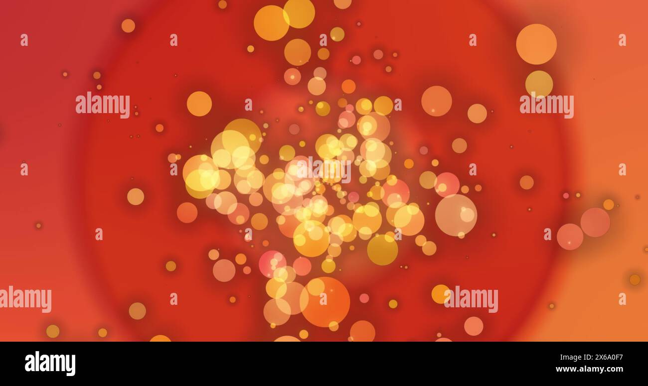 Image of yellow and orange bokeh circles of light floating on red and ...