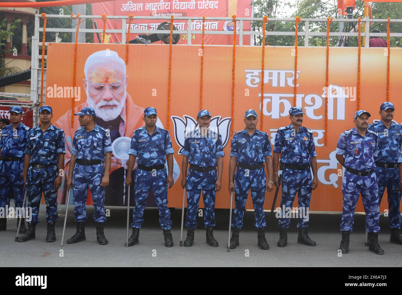 Varanasi, India. 13th May, 2024. Security personnel stand guard before ...