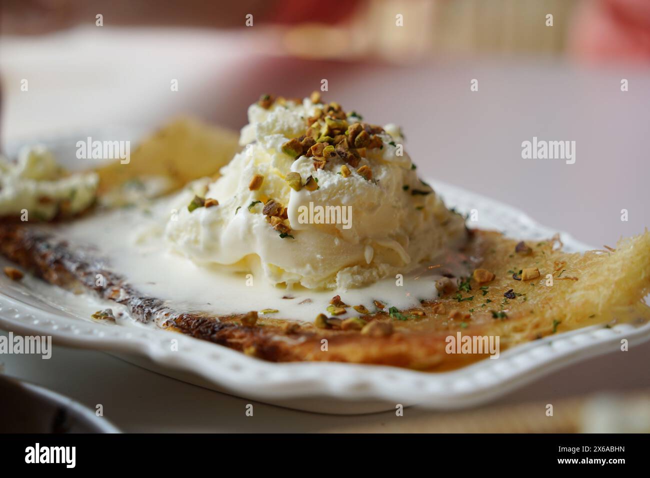 Nut topped vanilla ice cream hi-res stock photography and images - Alamy