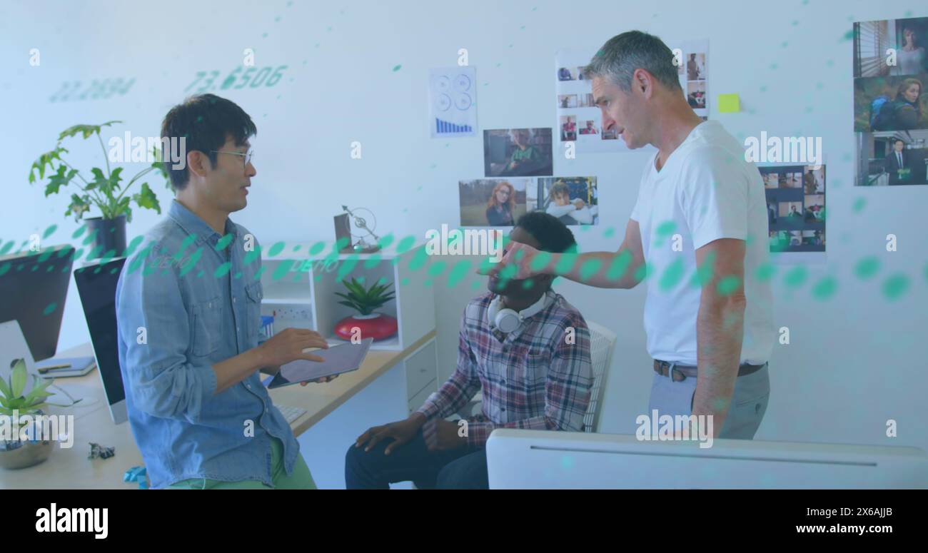 Image of data processing over three diverse men discussing together at office Stock Photo