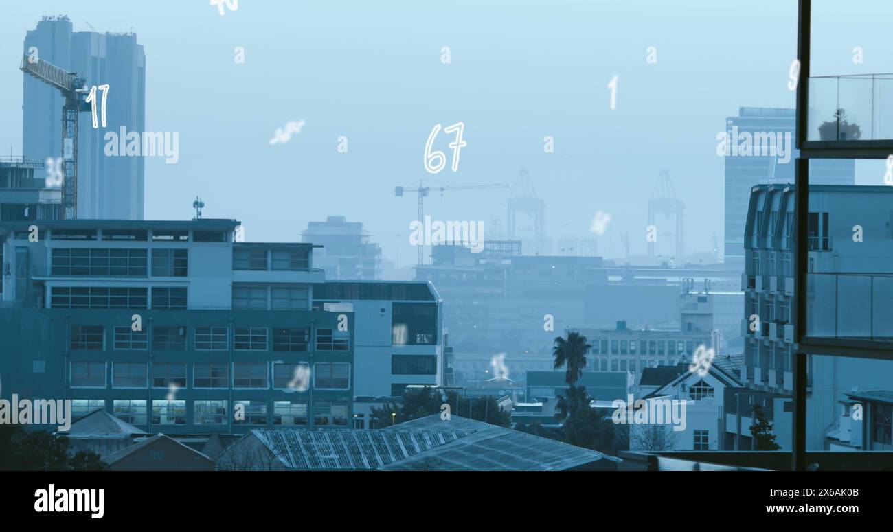 Image of numbers and data processing over cityscape Stock Photo