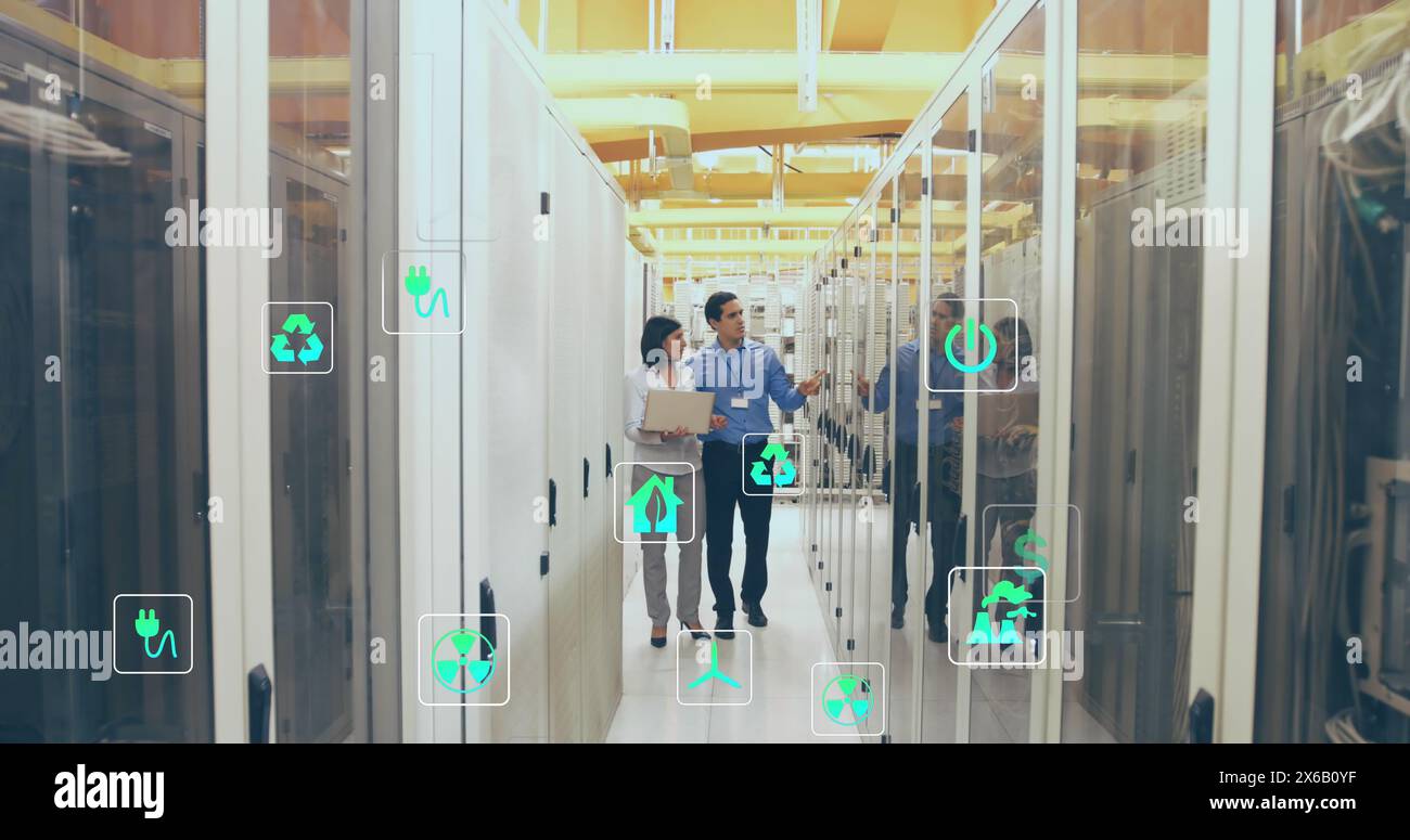 Image of falling icons over server room Stock Photo