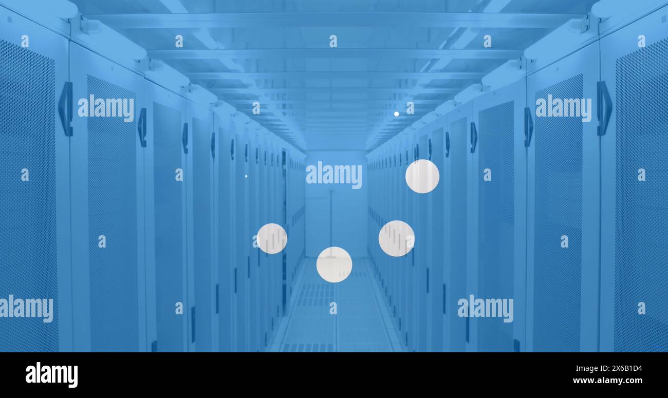 Image of white spots over server room Stock Photo