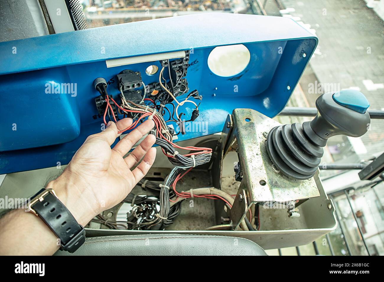 Repair and commissioning of tower cranes on joysticks and electrical systems Stock Photo