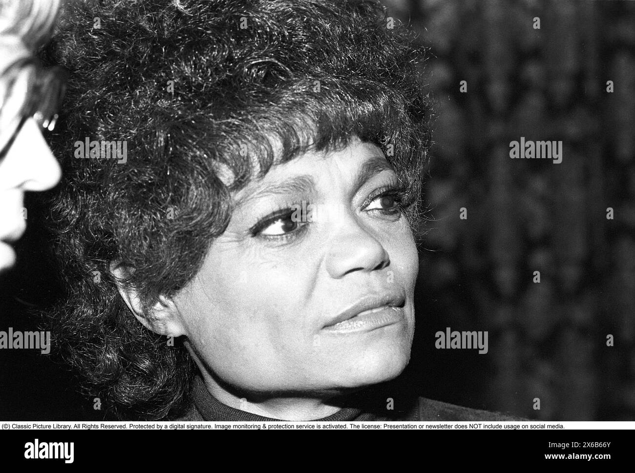 Eartha Mae Kitt (born Keith; January 17, 1927 – December 25, 2008) was an American singer and actress known for her highly distinctive singing style and her 1953 recordings of 'C'est si bon' and the Christmas novelty song 'Santa Baby'. Pictured when visiting Sweden in the 1970s. Stock Photo