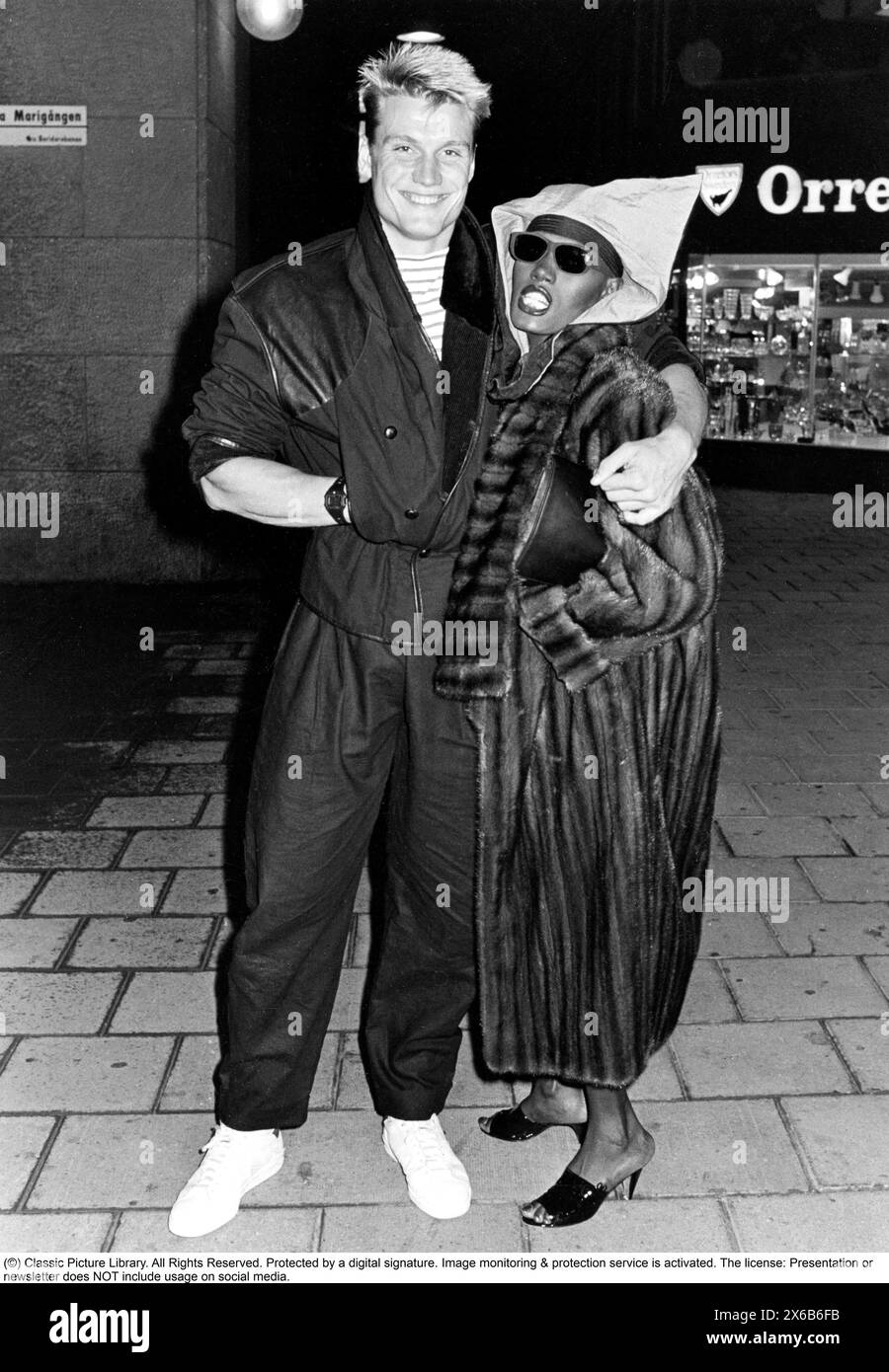 Dolph Lundgren. Swedish actor born 1957. Pictured with Grace Jones. They were a couple at the time they starred in the James Bond feature film A view to a kill 1985.   In 1985, Lundgren had a breakthrough role playing the lead villain as an imposing Soviet boxer named Ivan Drago in Sylvester Stallone's Rocky IV. Pictured when in Stockholm Sweden 1985. *** Local Caption *** Stock Photo