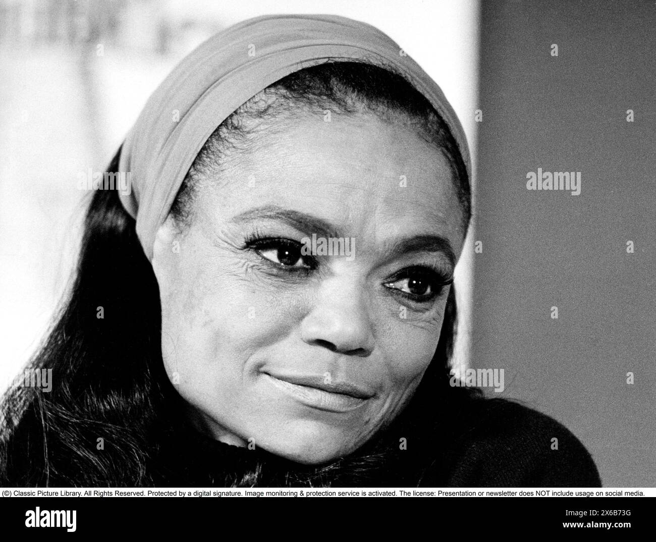 Eartha Mae Kitt (born Keith; January 17, 1927 – December 25, 2008) was an American singer and actress known for her highly distinctive singing style and her 1953 recordings of 'C'est si bon' and the Christmas novelty song 'Santa Baby'. Pictured when visiting Sweden January 25 1975. Stock Photo