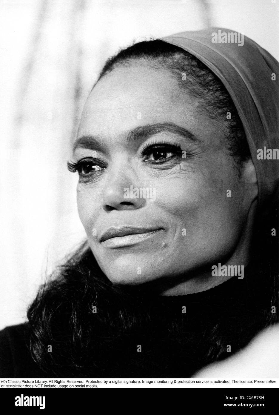 Eartha Mae Kitt (born Keith; January 17, 1927 – December 25, 2008) was an American singer and actress known for her highly distinctive singing style and her 1953 recordings of 'C'est si bon' and the Christmas novelty song 'Santa Baby'. Pictured when visiting Sweden January 25 1975. Stock Photo