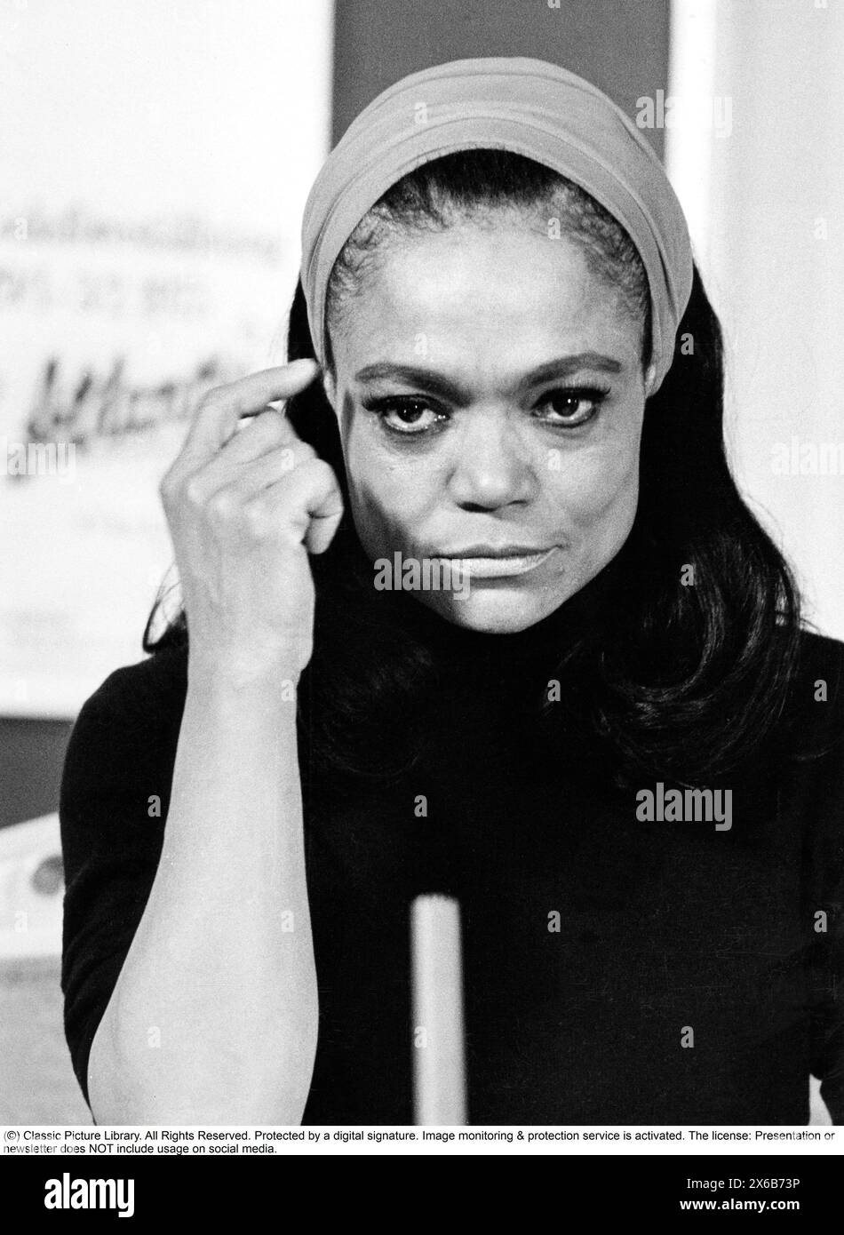 Eartha Mae Kitt (born Keith; January 17, 1927 – December 25, 2008) was an American singer and actress known for her highly distinctive singing style and her 1953 recordings of 'C'est si bon' and the Christmas novelty song 'Santa Baby'. Pictured when visiting Sweden January 25 1975. Stock Photo