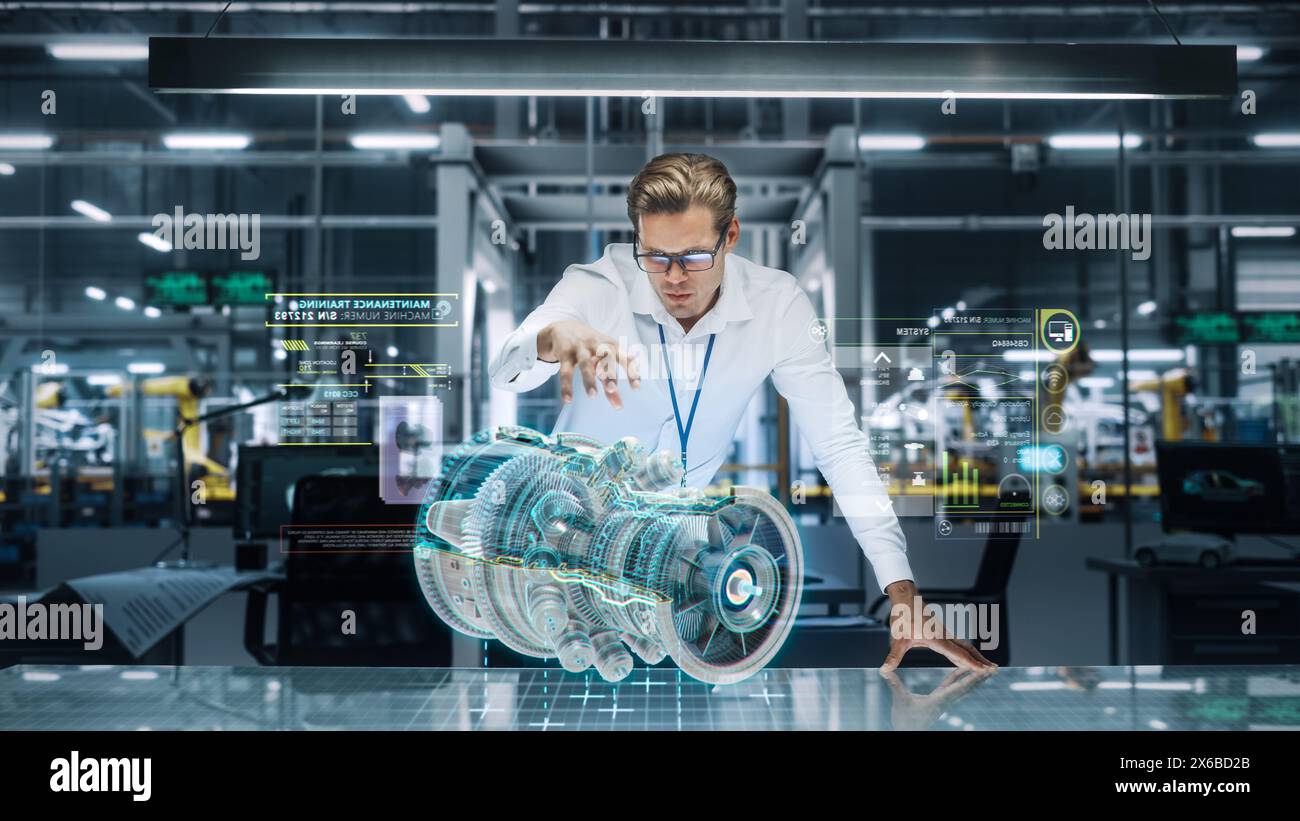 Confident Engineer in White Shirt Working on Jet Engine with Use of Augmented Reality Hologram in an Office at Plane Assembly Plant. Industrial Specialist Working in Technological Development Facility Stock Photo