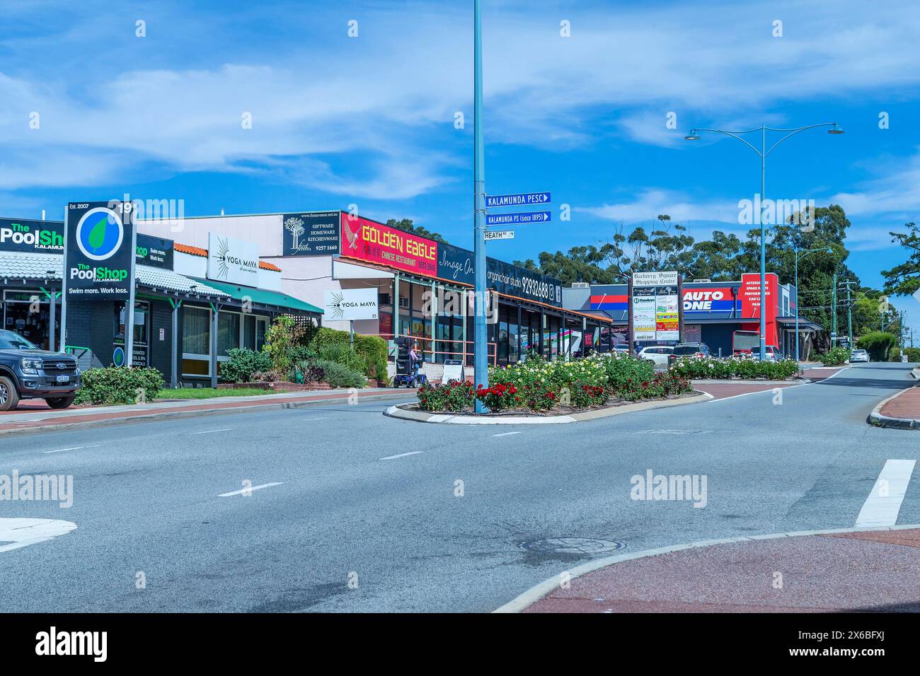 Shops and Auto One garage on the Canning road coming into Kalamunda a town and eastern suburb of Perth, Western Australia,. Stock Photo