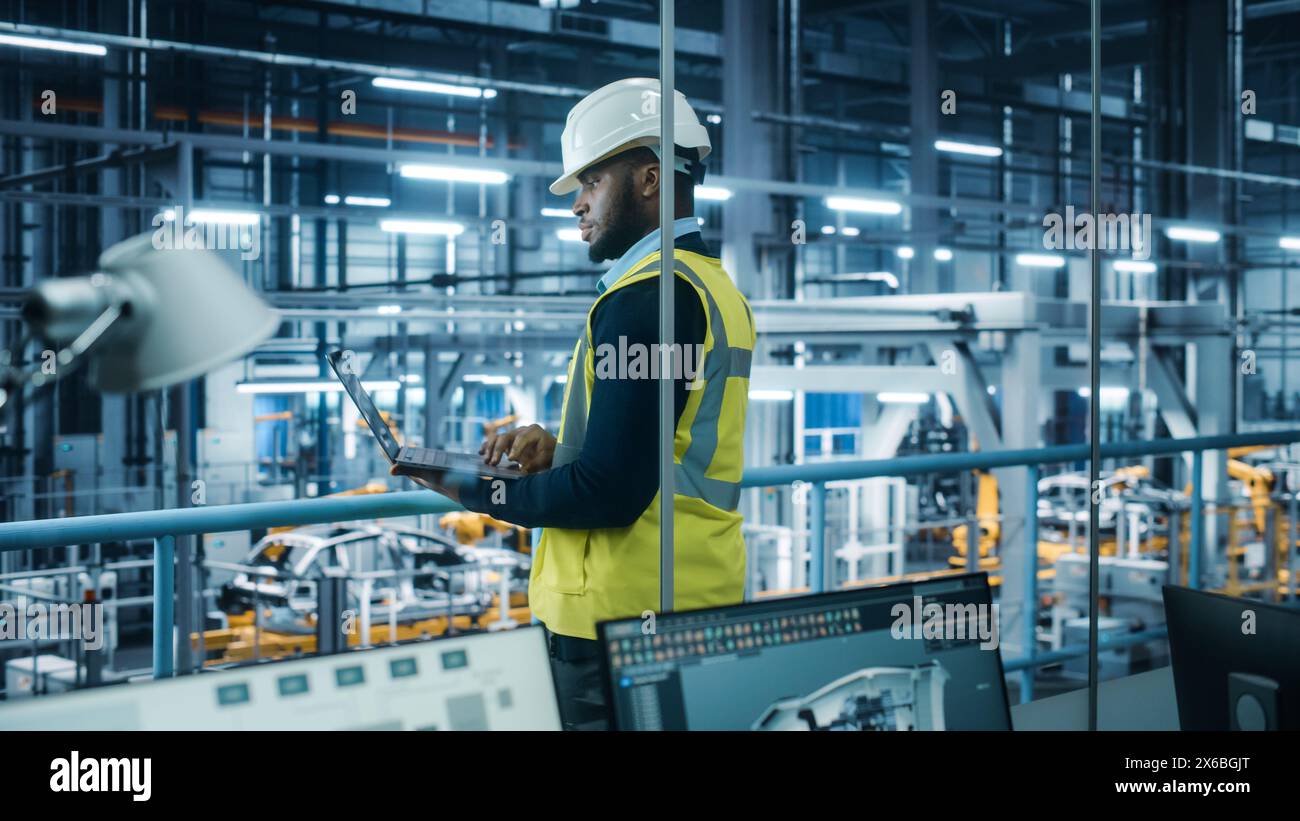 Car Factory: Professional Male Automotive Engineer Wearing Hard Hat ...