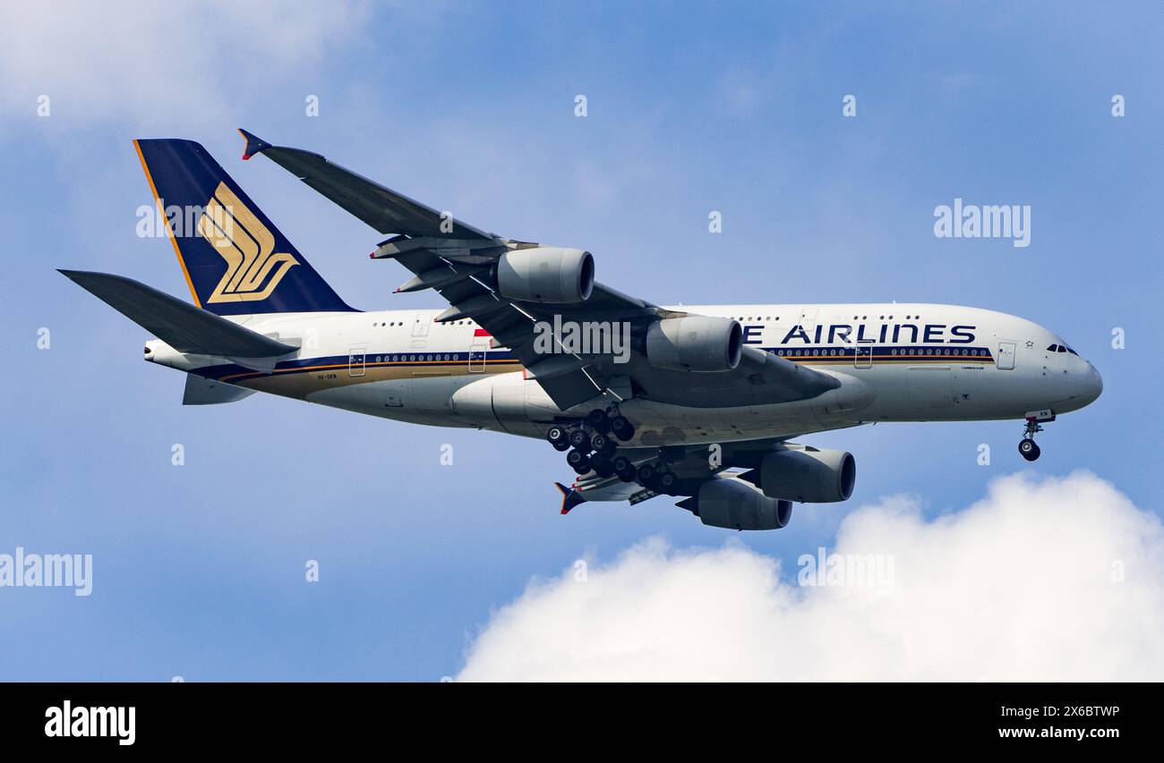 A Singapore Airlines Airbus A380-841, registration 9V-SKN, lands at LHR ...