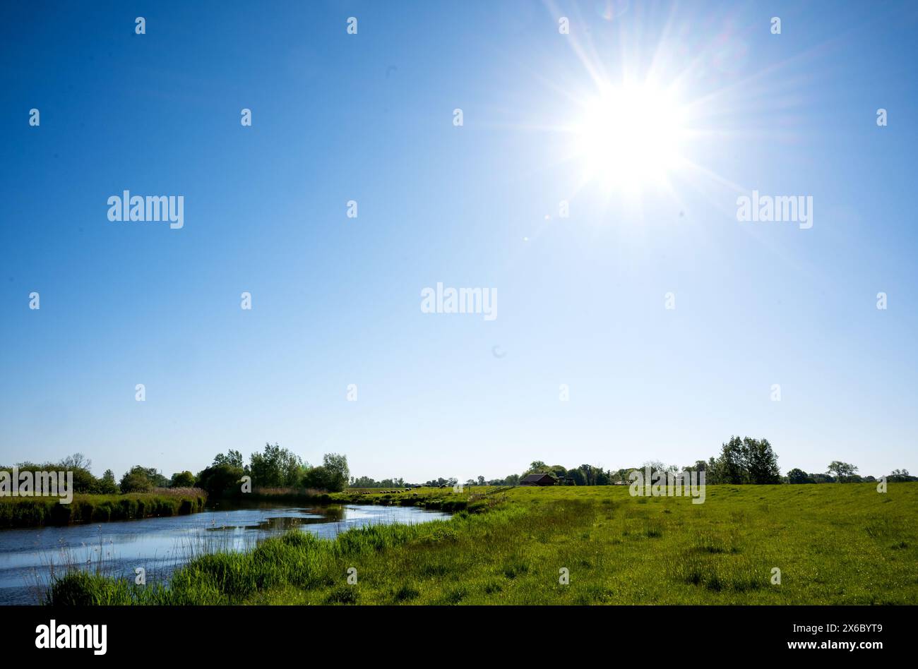 14 May 2024, Lower Saxony, Kranenburg: View of the Oste river. The search for the six-year-old boy Arian from Bremervörde, who has been missing since April 22, is to continue from Wednesday. Photo: Daniel Bockwoldt/dpa Stock Photo