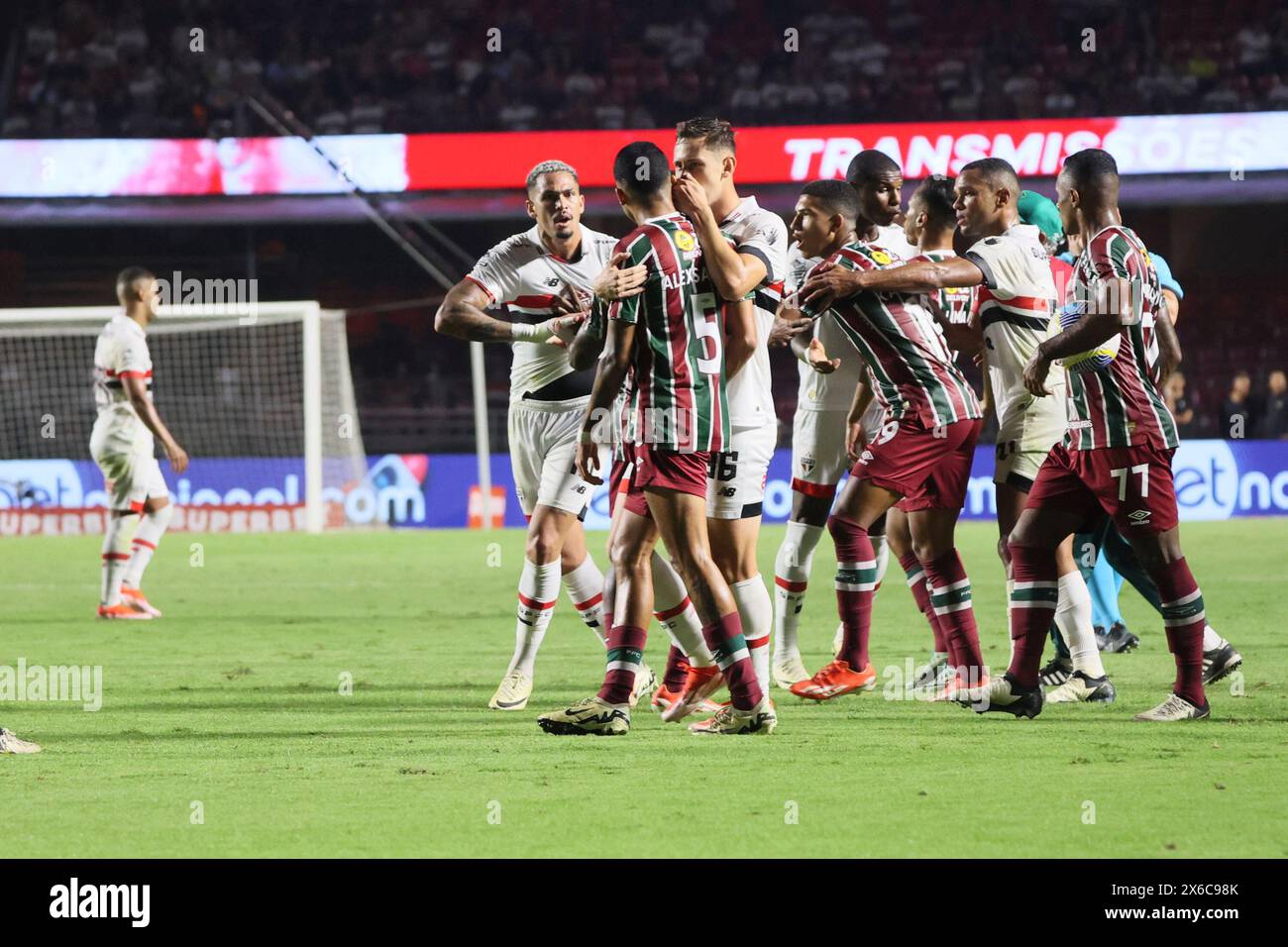 May 13, 2024, Sao Paulo, Sao Paulo, Brasil: Sao Paulo (SP), 05/13/2024 - CHAMPIONSHIP/FOOTBALL/SAO PAULO/FLUMINENSE - Coach Fernando Diniz, from Fluminense, gets involved in an argument with striker Luciano, from Sao Paulo, causing widespread confusion during the match between Sao Paulo and Fluminense, valid for the 6th round of the Brazilian Championship Series A 2024, held at the Morumbis stadium, in the capital of Sao Paulo, on Monday night (13). Referee Anderson Daronco sent off the coach of the Rio club and penalized the home team's striker with a yellow card. Sao Paulo won the match 2-1. Stock Photo