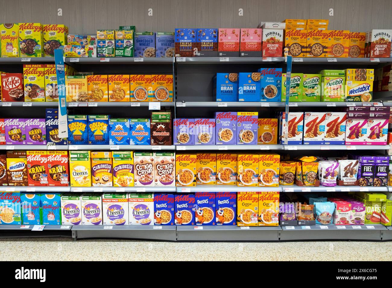 Rows of boxes of various brands of breakfast cereal on shelves in Co Op  CoOp CoOperative supermarket Great Britain UK   KATHY DEWITT Stock Photo