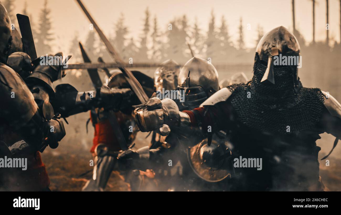 Epic Battlefield: Armies of Medieval Knights Fighting with Swords. Dark Age War, Crusade, Conquest. Bloody Battle of Savage Warrior Soldiers. Cinematic Historical Reenactment. Stock Photo