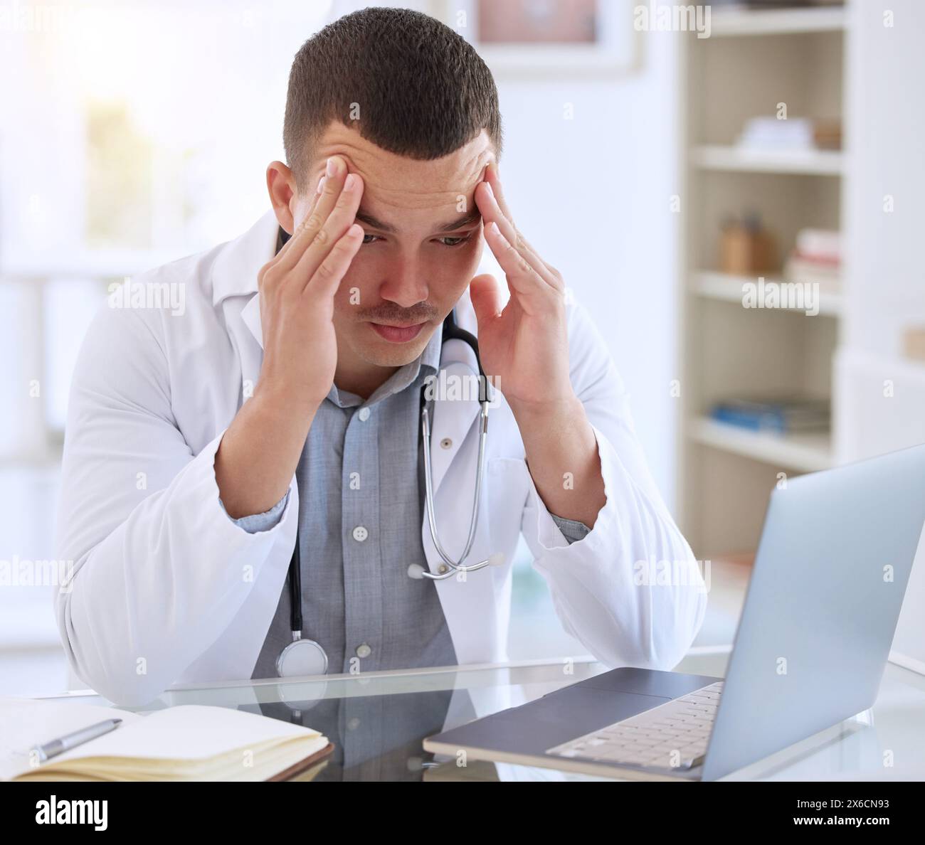 Doctor, laptop and man in clinic with stress for surgery mistake ...
