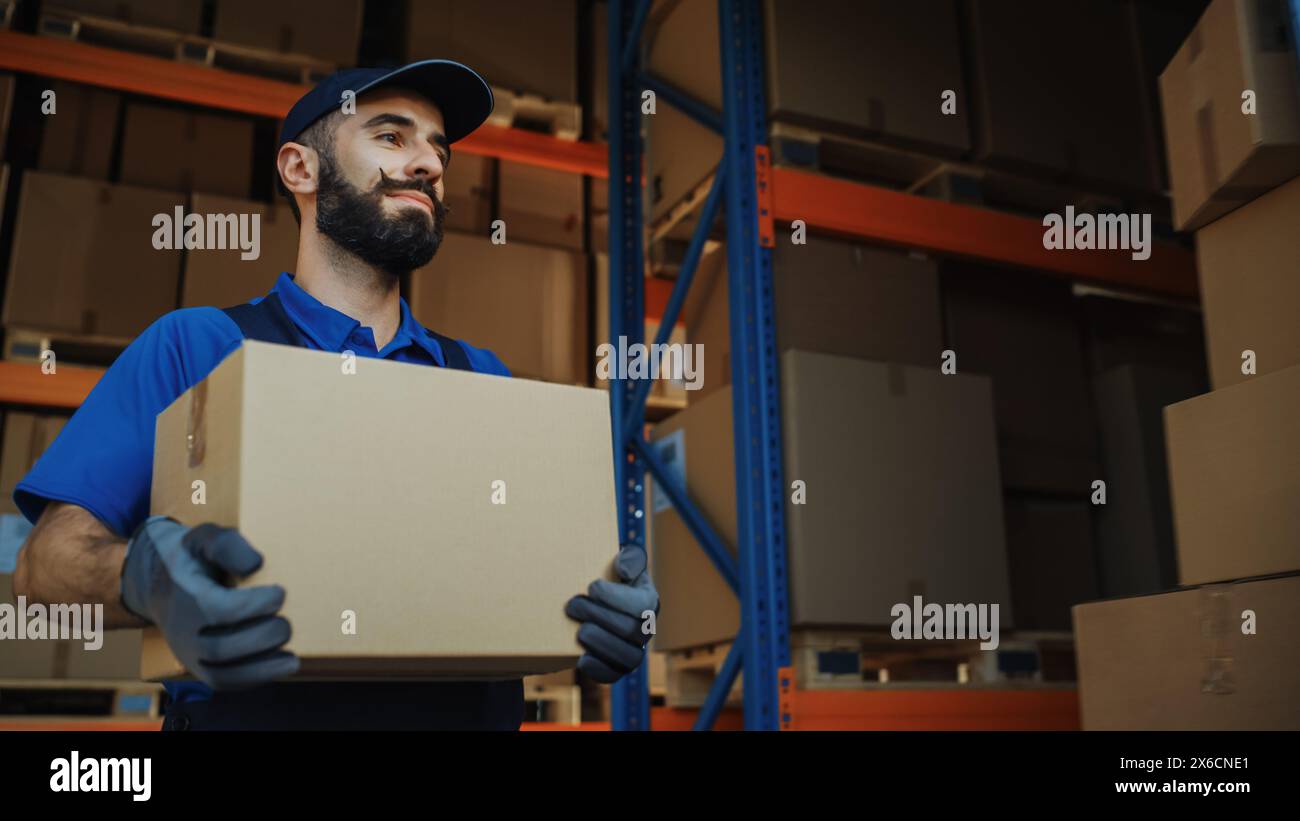 Handsome warehouse worker walks hi-res stock photography and images - Alamy