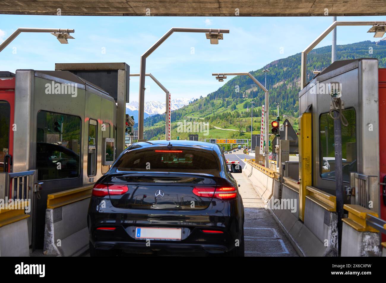 Brenner, Autobahn, Italy - 11 May 2024: Vehicle paying the highway toll in Italy at the toll station *** Fahrzeug am Bezahlen der Autobahnmaut in Italien an der Mautstation Stock Photo