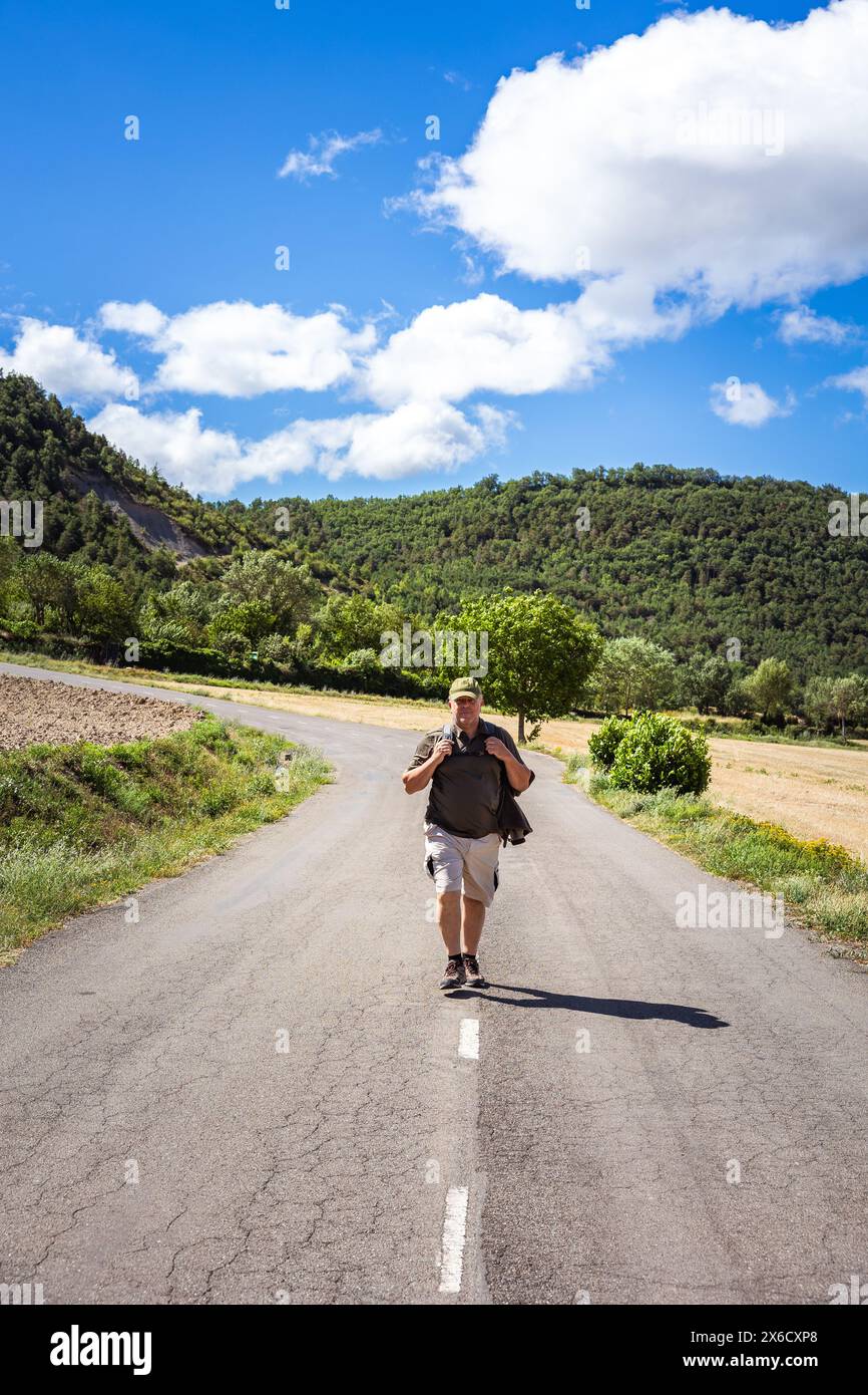 Lone hiker backpack walking hi-res stock photography and images - Alamy