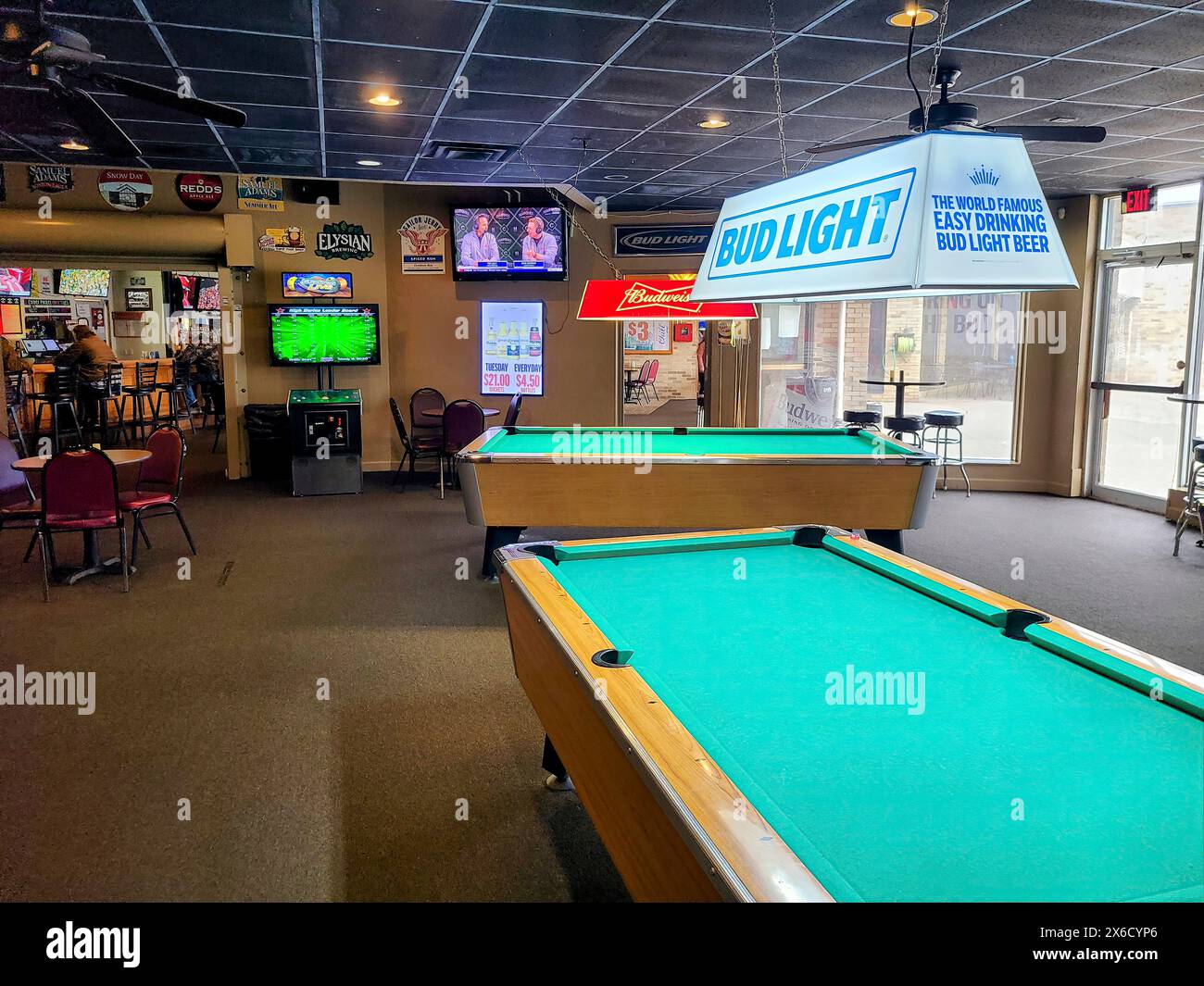 Casual Sports Bar with Pool Table and TV Screens, EyeLevel View Stock