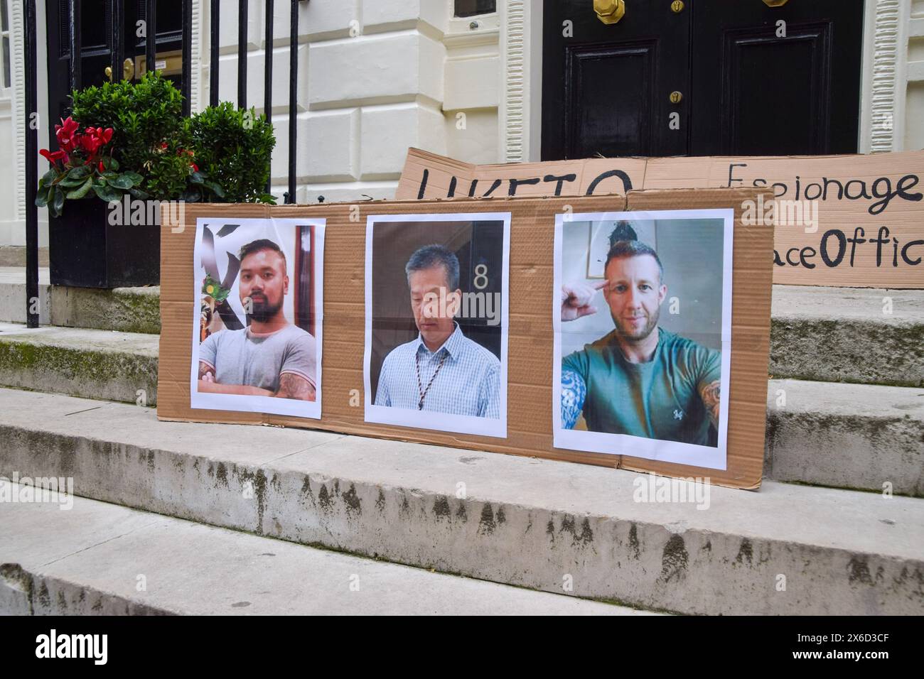 London, UK. 14th May, 2024. Pictures of Chi Leung Wai, Chung Biu Yuen, and Matthew Trickett, the men charged with alleged spying, are seen during the demonstration. UK Hong Kongers and supporters staged a protest outside the Hong Kong Economic and Trade Office (HKETO) in London against the Chinese Government's alleged spying and repression activities, following the arrest of three people on charges of spying for Hong Kong. (Photo by Vuk Valcic/SOPA Images/Sipa USA) Credit: Sipa USA/Alamy Live News Stock Photo