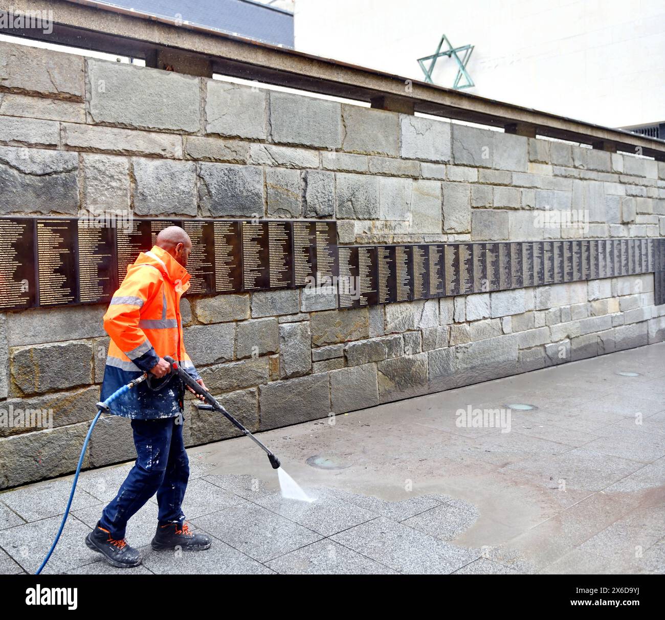 Paris, France. 14th May, 2024. A city employee is at work to clean the