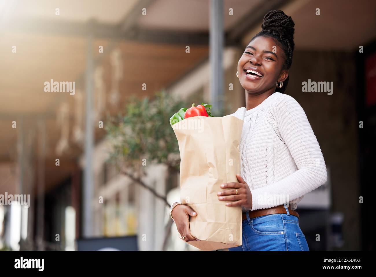 Bag, groceries and black woman for shopping, outside and vegetables for healthy food. Face, smile and happy for promo and discount on sale for produce Stock Photo