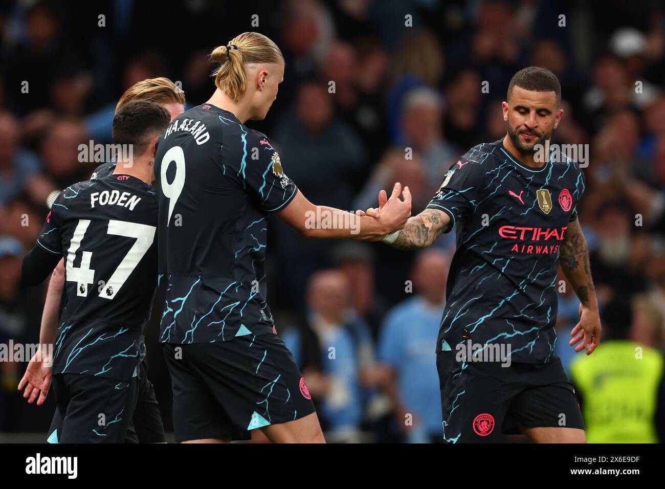 Tottenham Hotspur Stadium, London, UK. 14th May, 2024. Premier League Football, Tottenham Hotspur versus Manchester City; Erling Haaland of Manchester City celebrates with Kyle Walker after he scores for 0-1 in the 51st minute Credit: Action Plus Sports/Alamy Live News Stock Photo