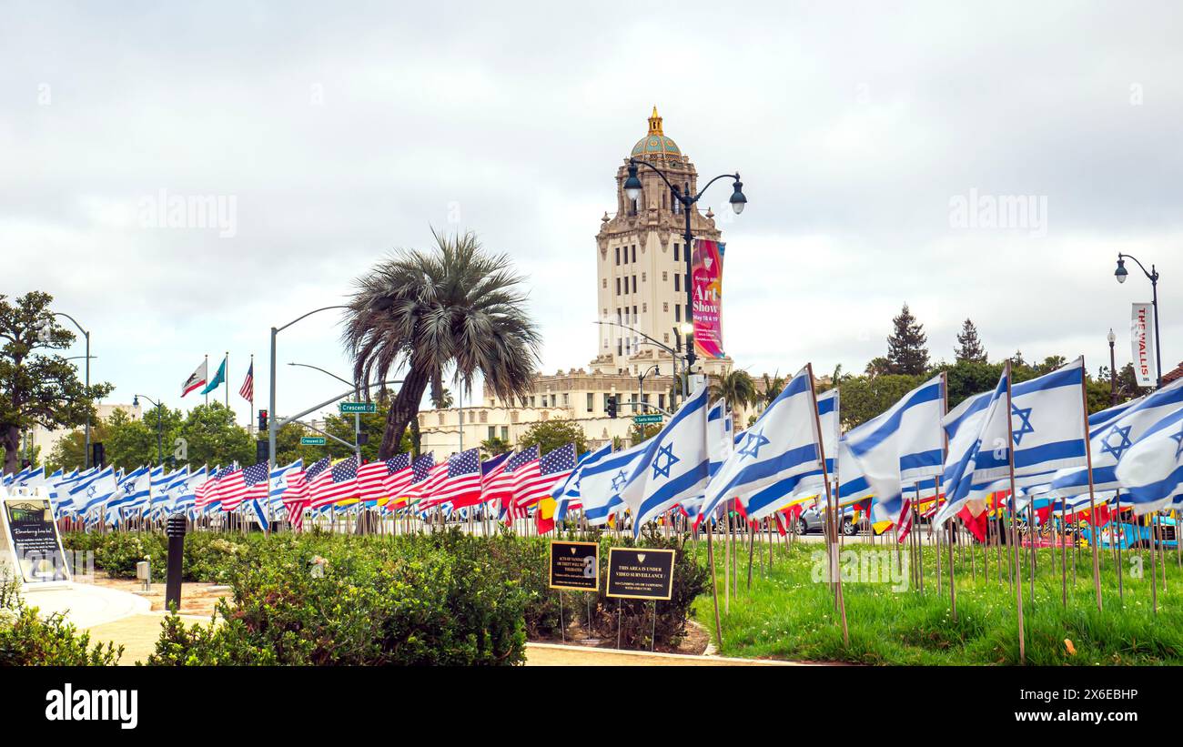 Israeli flags, American flags, and other national flags in a memorial to the victims of the October 7 attacks in Israel, on display in Beverly Hills Stock Photo