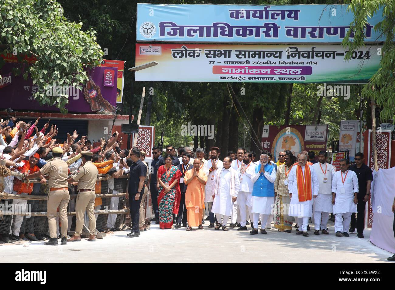 Varanasi, India. 14th May, 2024. Indian Prime Minister Narendra Modi (C) leaves accompanied by India's Home Minister Amit Shah (R) and Uttar Pradesh Chief Minister Yogi Adityanath (L) after filing his nomination papers for the general elections in Varanasi. (Photo by Prabhat Mehrotra/SOPA Images/Sipa USA) Credit: Sipa USA/Alamy Live News Stock Photo