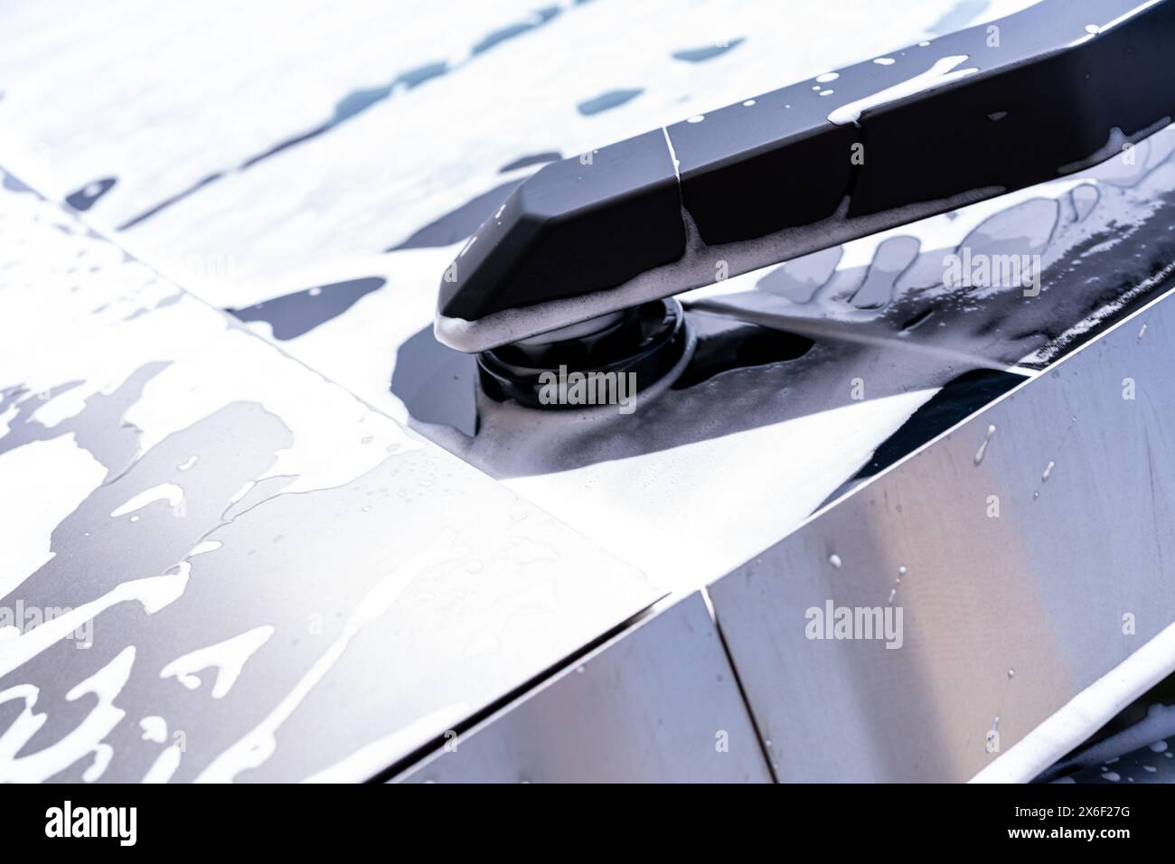 Detailed View of Tesla Cybertruck Windshield Wiper During Car Wash