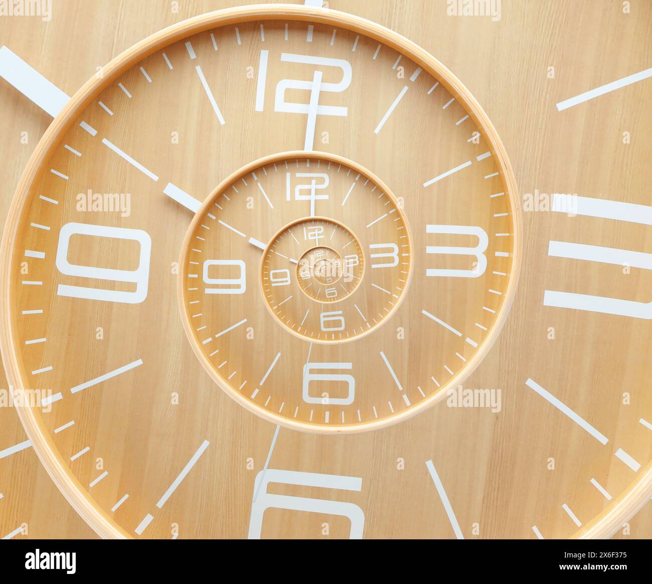 Infinity and other time related concepts. Wooden clock face twisted in ...
