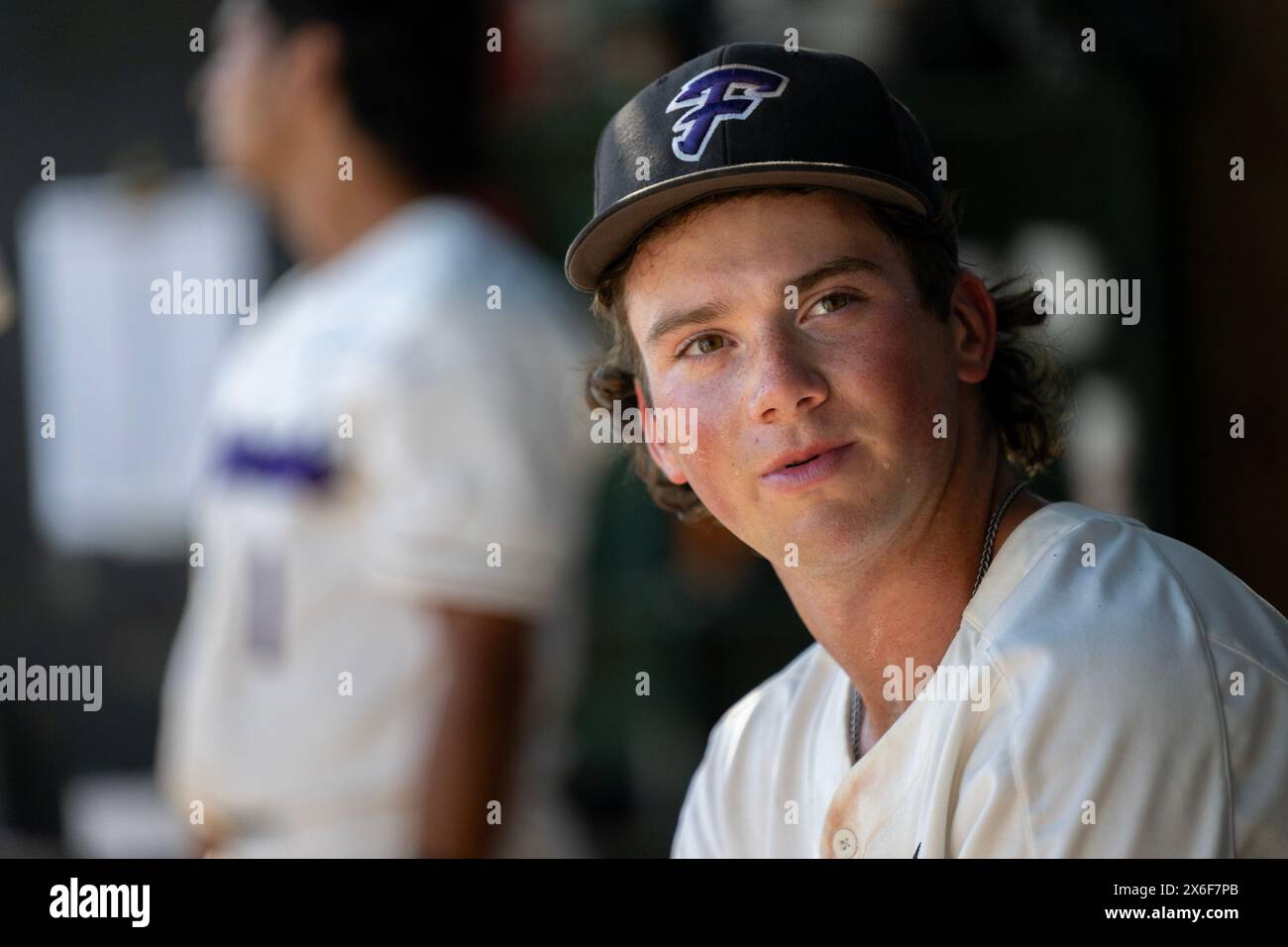 Elk Grove, Ca, USA. 9th May, 2024. Franklin Wildcats pitcher Nic Abraham waits in the dugout between inning during a game against the Turlock Bulldogs at Franklin High School on Thursday, May 9, 2024 in Elk Grove. (Credit Image: © Paul Kitagaki Jr./ZUMA Press Wire) EDITORIAL USAGE ONLY! Not for Commercial USAGE! Stock Photo