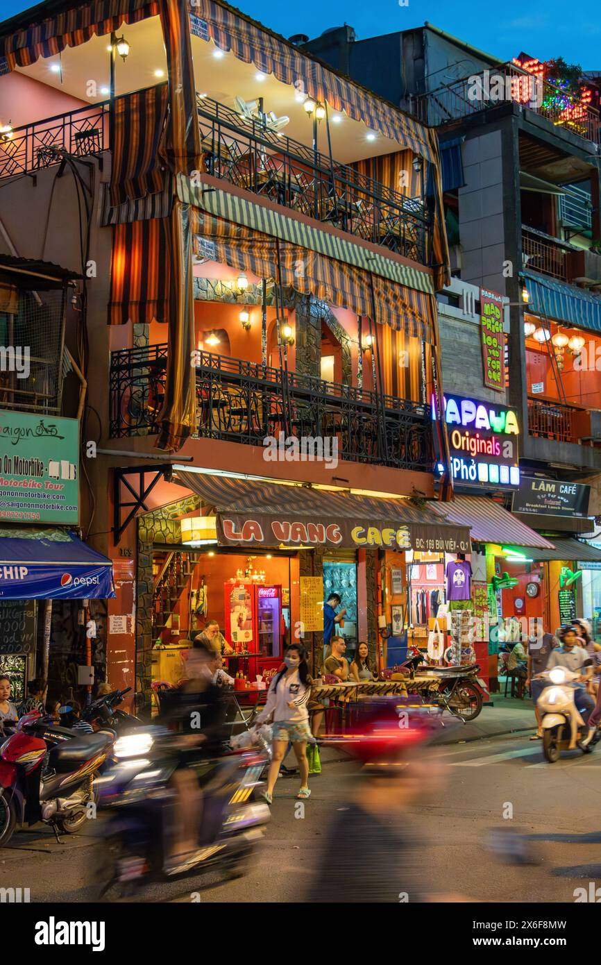 SAIGON, VIETNAM, DEC 17 2017, Sunset in the streets of Saigon, Evening Street with bars and pubs in the center of Ho Chi Minh city. Stock Photo