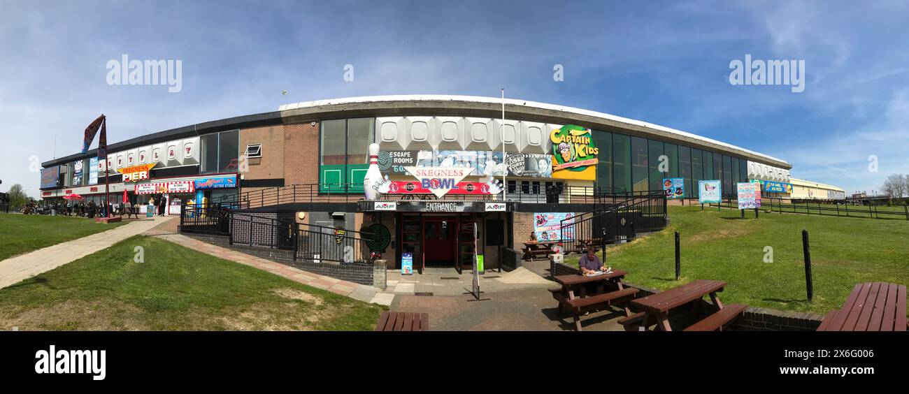 Panoramic view of Skegness Pier featuring the entrance to the Skegness Bowl during summer Stock Photo