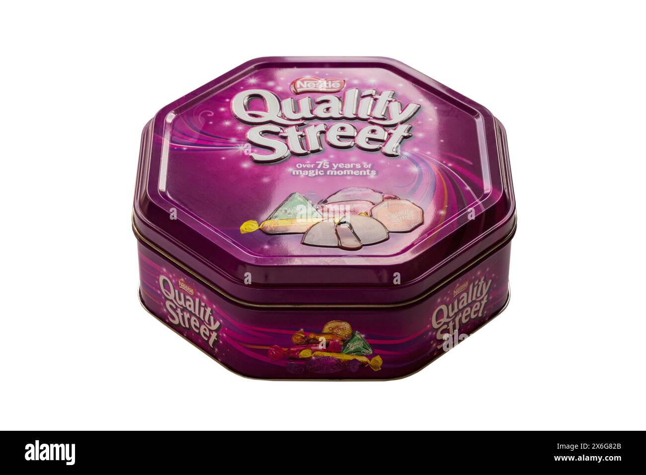 Tin of Nestle Quality Street chocolates sweets metal tin isolated on white background - over 75 years of magic moments Stock Photo