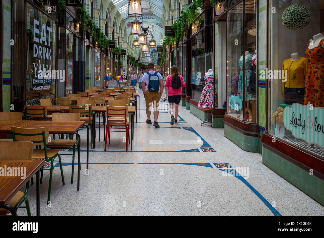The Royal Arcade Norwich - Shoppers in the Royal Arcade in central Norwich - Opened in 1899, architect George Skipper Stock Photo