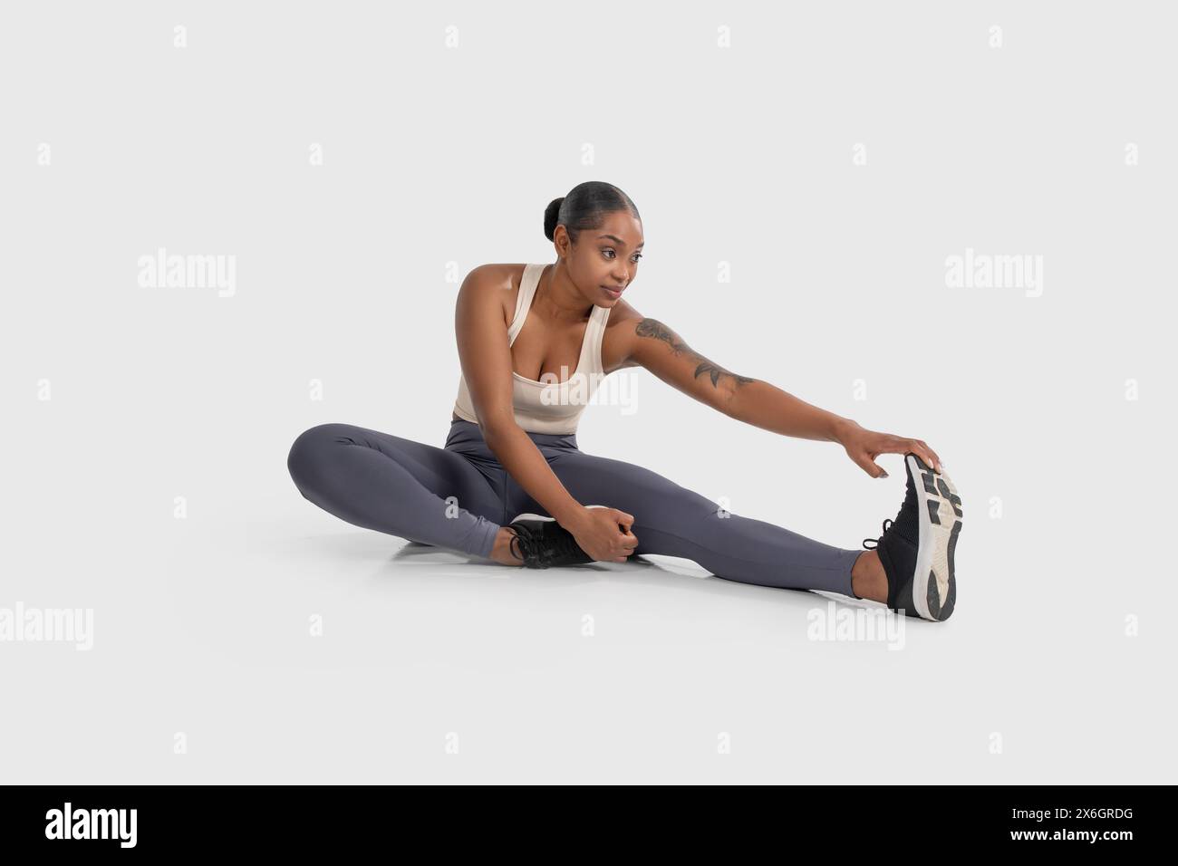 Woman performing arm exercises hi-res stock photography and images - Alamy