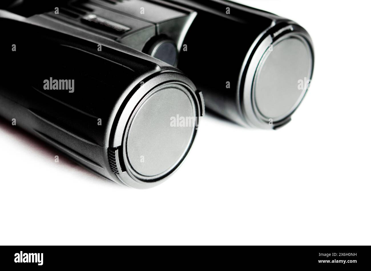 Black binoculars close up on a white background. binocular Stock Photo