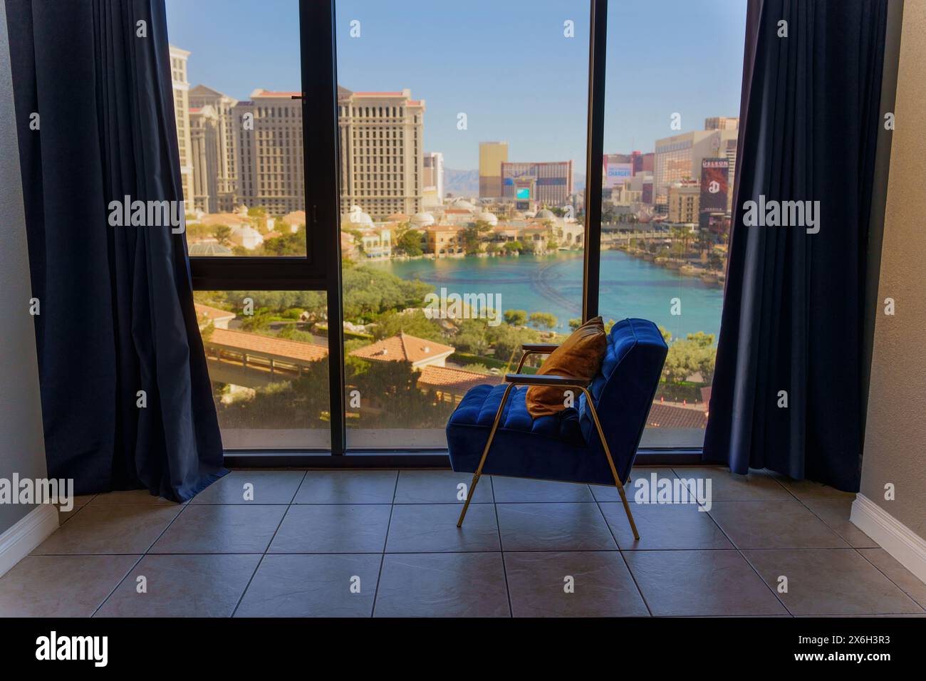 Las Vegas, Nevada - April 14, 2024: Hotel Room Window View Overlooking the Bellagio Fountains Lake Stock Photo