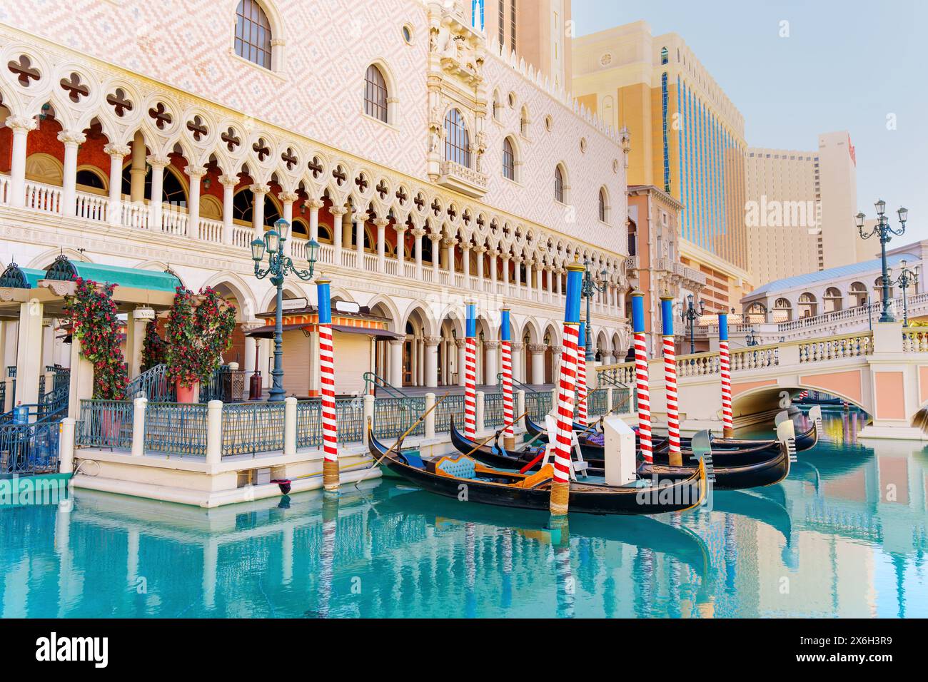 Las Vegas, Nevada - April 13, 2024: Venetian-Style Gondolas Awaiting Passengers Along the Casino Canal Stock Photo