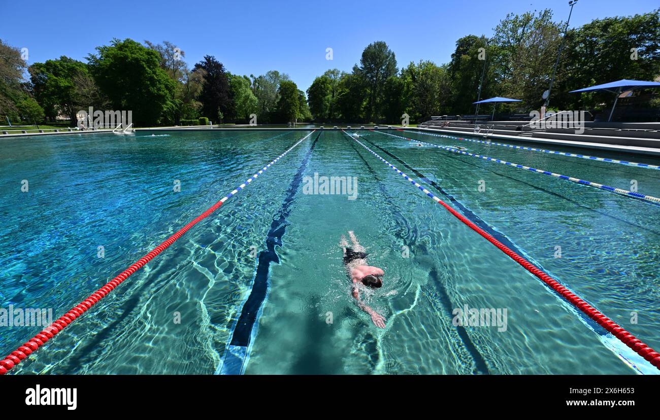 15 May 2024, Thuringia, Weimar A swimmer in the water at Weimar's