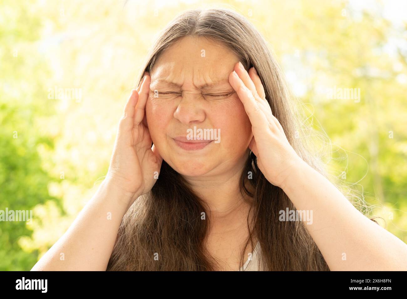 Mature woman feeling hot hires stock photography and images Alamy