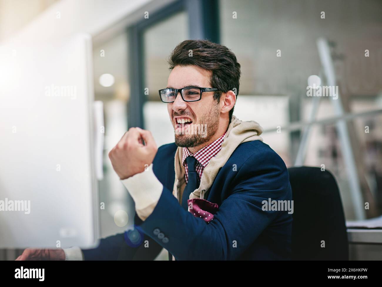 Excited businessman, fist pump and winning with computer for promotion ...
