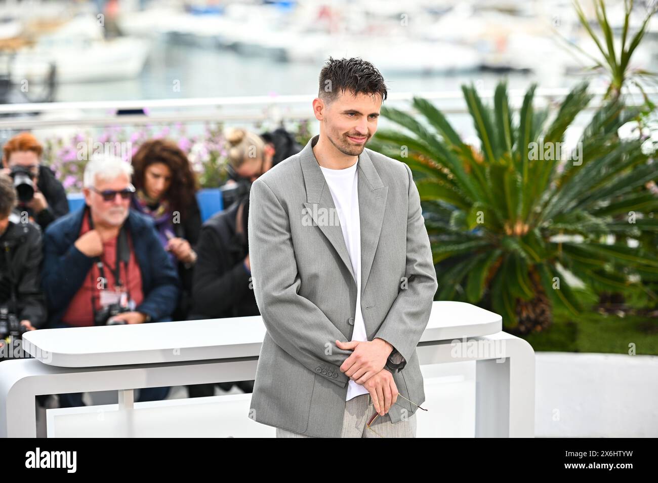 Raphael Quenard is attending the photocall at the 76th annual Cannes