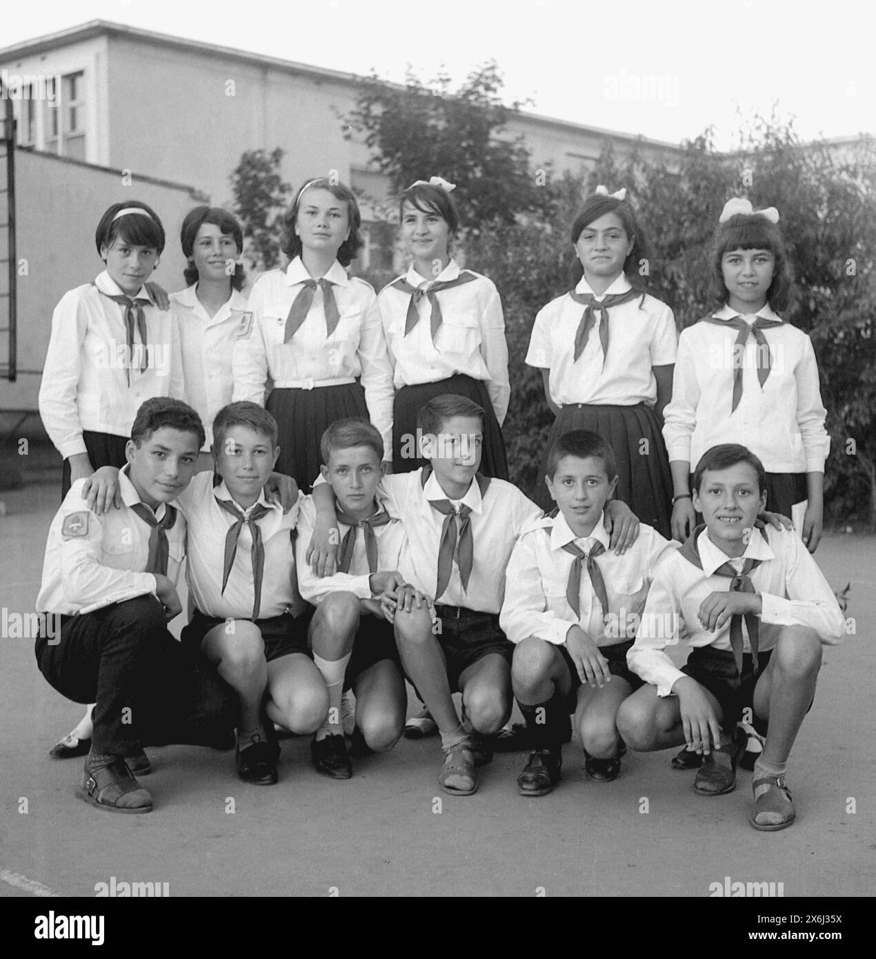 Group of middle schoolers wearing the standardized 'Pioneer' uniform in communist Romania in the 1970s Stock Photo